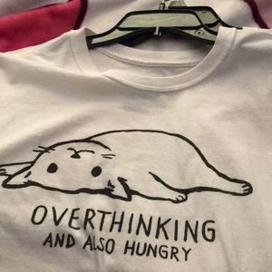 White shirt with cat on it